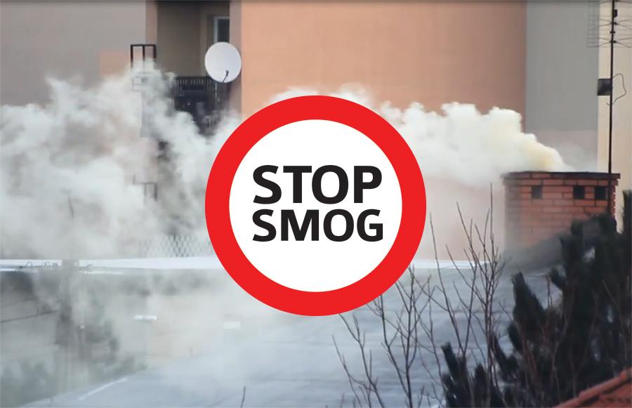 znak stop smog na tle dymu z komina